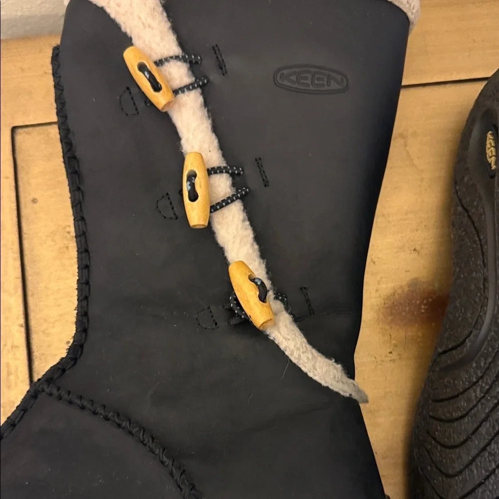 Black Shearling-Trim Winter Boots with Toggle Accents